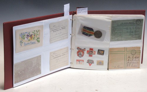 Lot 135 - A first world war postcard album 215 postcards...
