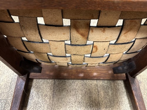 Lot 168 - Attributed to Arthur Simpson (1857-1922) of Kendal, an Arts and Crafts oak stool