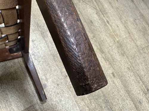 Lot 168 - Attributed to Arthur Simpson (1857-1922) of Kendal, an Arts and Crafts oak stool