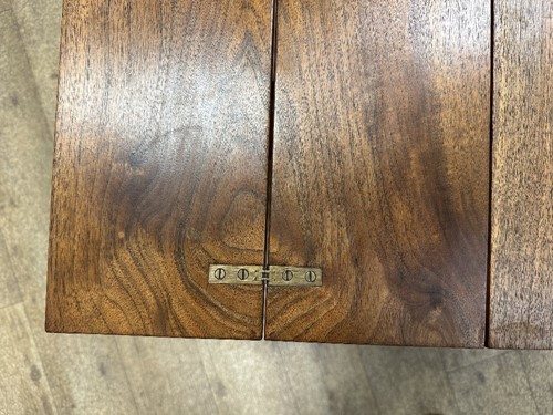 Lot 191 - Attributed to Frederick (Fred) Francis Foster (1885-1968), a metamorphic walnut occasional table