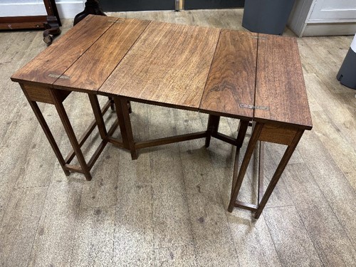Lot 191 - Attributed to Frederick (Fred) Francis Foster (1885-1968), a metamorphic walnut occasional table