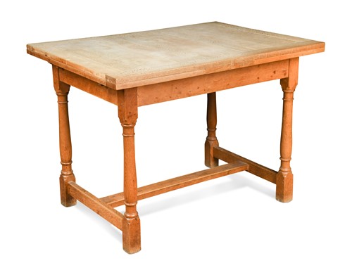 Lot 201 - A Heal's golden oak draw-leaf dining table, circa 1930