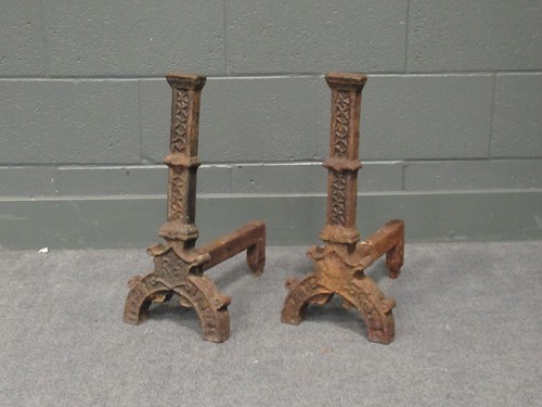 Lot 629 - A pair of 16th century style cast iron fire...