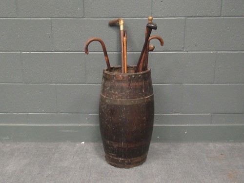 Lot 637 - A 19th-century coopered oak barrel/ stick...