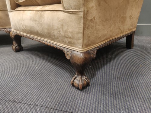 Lot 681 - A pair of 1920s/30s armchairs, the deep seats...