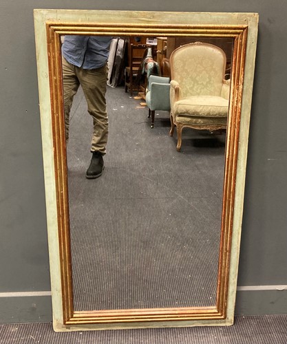 Lot 683 - A rectangular wall mirror, the blue painted...