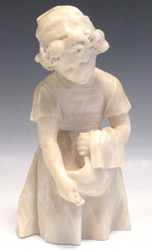 Lot 46 - A carved alabaster figure of a young woman...