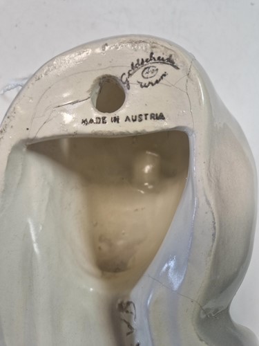 Lot 49 - A Goldscheider pottery wall mask