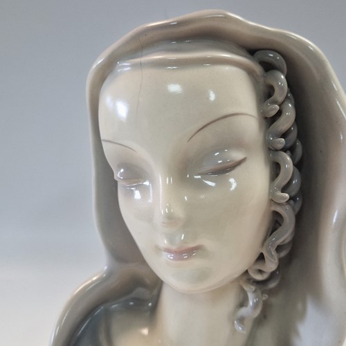 Lot 49 - A Goldscheider pottery wall mask
