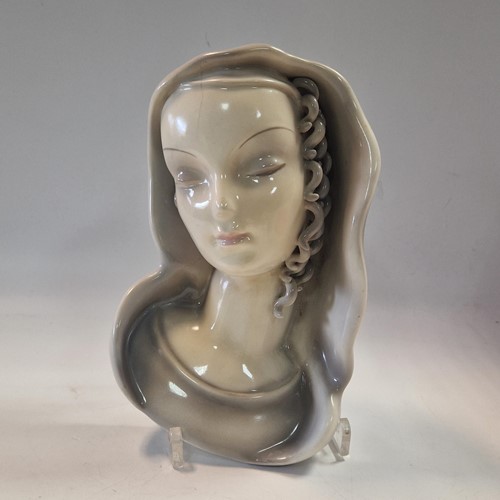 Lot 49 - A Goldscheider pottery wall mask