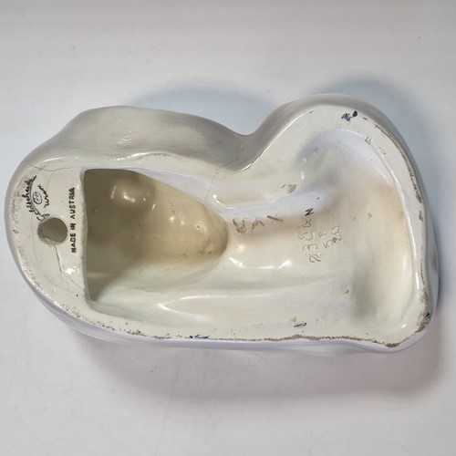 Lot 49 - A Goldscheider pottery wall mask