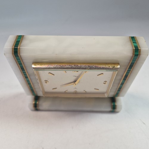 Lot 133 - Imhof, an Art Deco onyx, malachite, and gilt brass mounted mantel clock