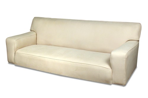 Lot 218 - Betty Joel (1894-1985), a large cream upholstered modernist sofa