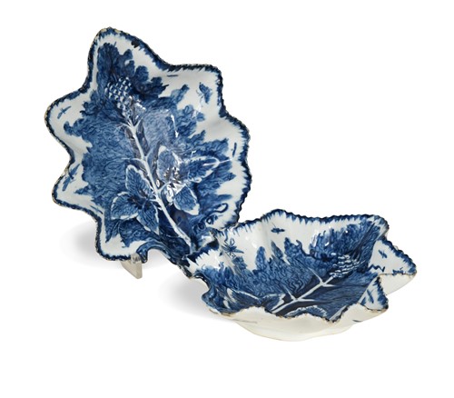 Lot 569 - A pair of Bow porcelain blue and white leaf shape dishes, circa 1755 - 60