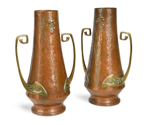 Lot 128 - A pair of WMF twin-handled copper and brass vases, circa 1900