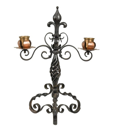 Lot 123 - An Arts & Crafts copper and wrought iron twin-branch candelabra