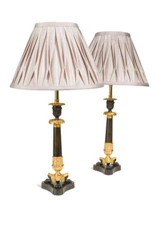 Lot 720 - A pair of bronze and gilt triform candlestick lamps, circa 1830
