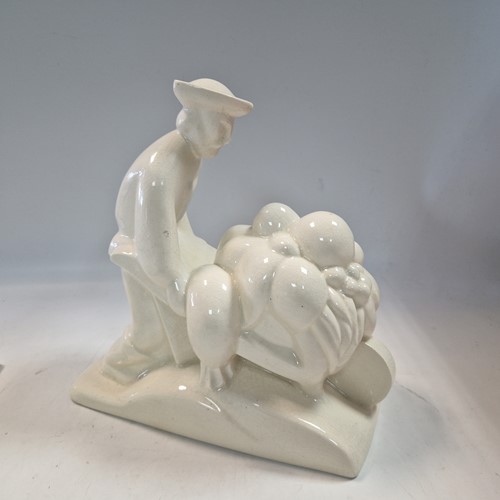 Lot 48 - Primavera, France, an Art Deco crackle glaze model of a man with a wheelbarrow