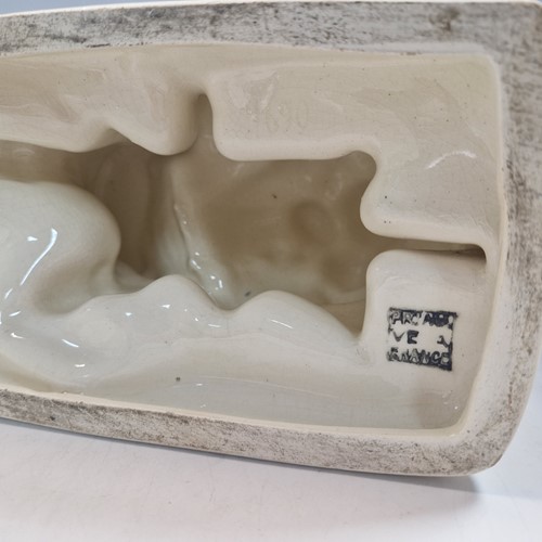 Lot 48 - Primavera, France, an Art Deco crackle glaze model of a man with a wheelbarrow