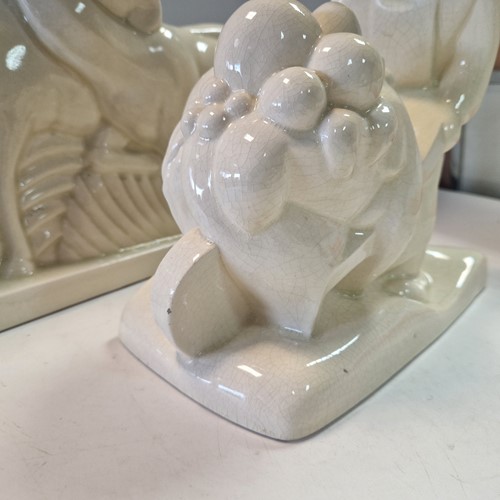 Lot 48 - Primavera, France, an Art Deco crackle glaze model of a man with a wheelbarrow