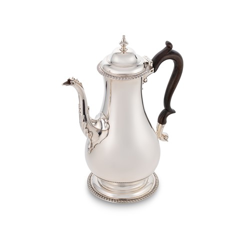 Lot 384 - A Victorian silver coffee pot