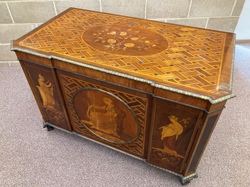 Lot 729 - A George III ormolu-mounted mahogany, amaranth, harewood and marquetry breakfront cabinet