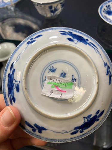 Lot 4 - A pair of Chinese blue and white tea bowls and saucers, Kangxi Period (1662-1722)