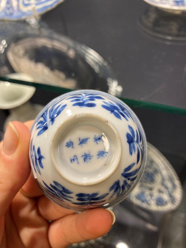 Lot 4 - A pair of Chinese blue and white tea bowls and saucers, Kangxi Period (1662-1722)