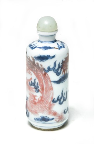 Lot 27 - A Chinese under-glaze blue and red snuff bottle, Qing Dynasty, 19th century