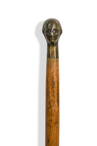 Lot 842 - A bronze mounted walking cane, early 20th century