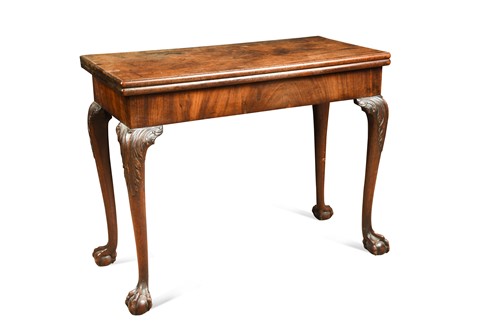 Lot 699 - A George III mahogany card table