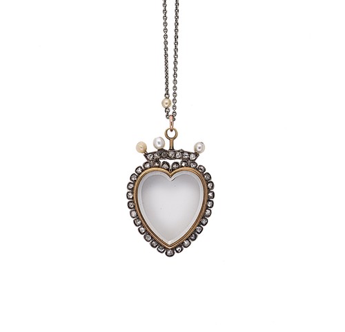 Lot 78 - A Victorian rock crystal, diamond and pearl heart pendant