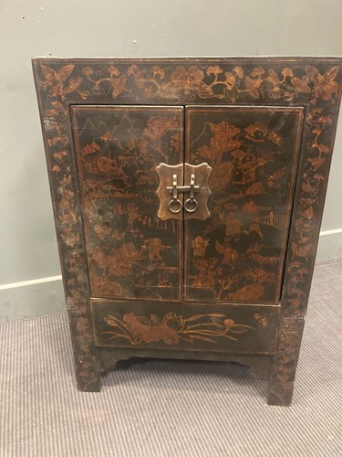 Lot 487 - A Chinese hardwood black painted cabinet...