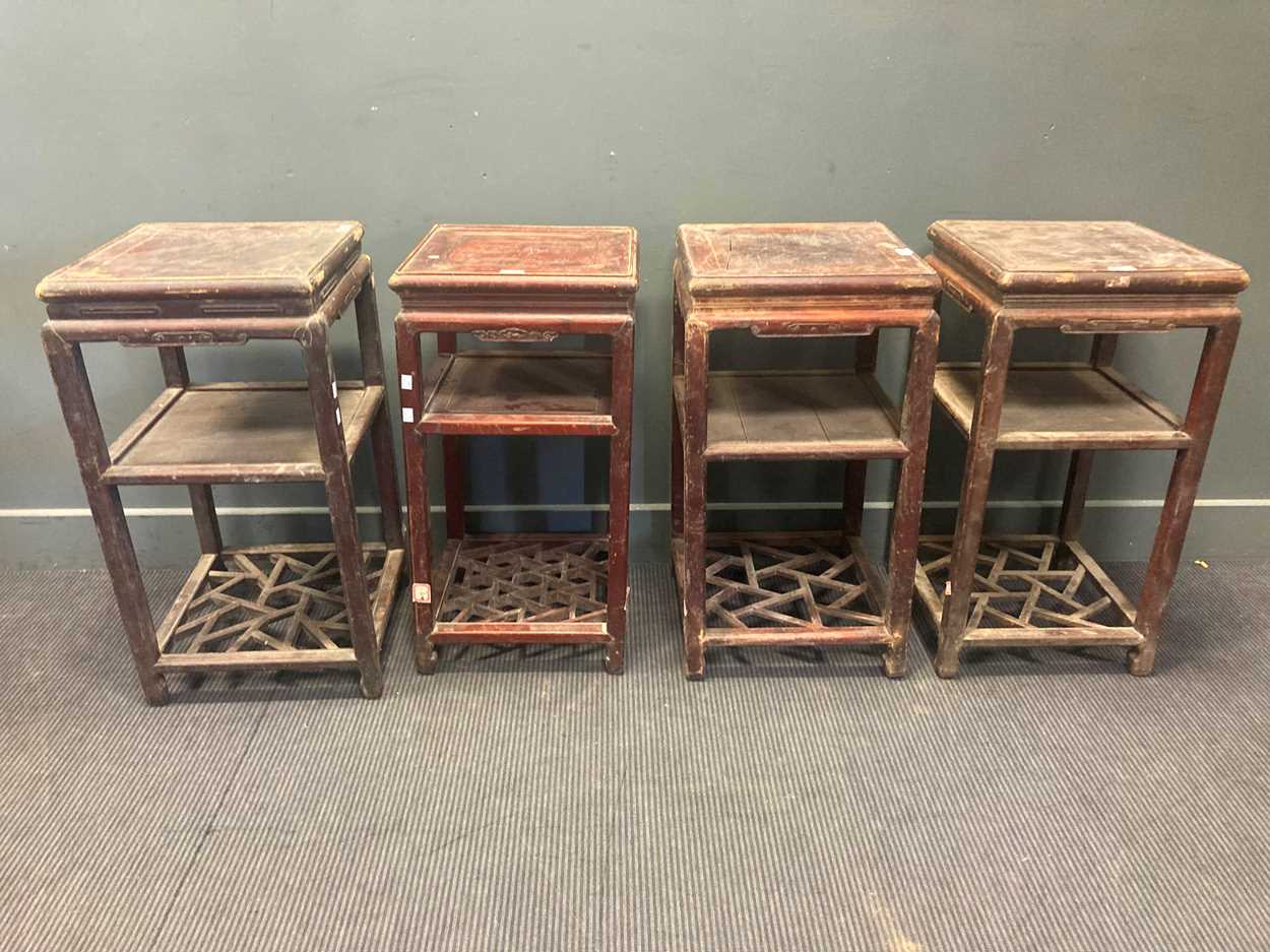 Lot 484 - A collection of four Chinese hardwood urn...
