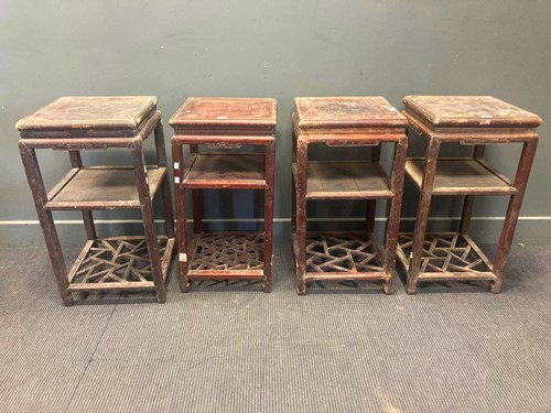 Lot 484 - A collection of four Chinese hardwood urn...