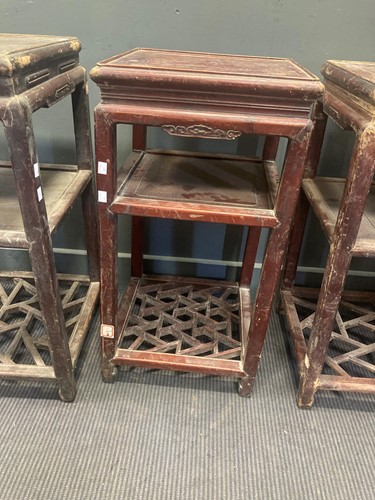 Lot 484 - A collection of four Chinese hardwood urn...