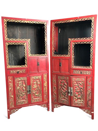 Lot 115 - A pair of Chinese carved wood red lacquer and parcel-gilt display cabinets, late Qing Dynasty