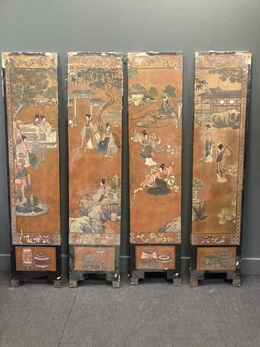Lot 507 - Four Chinese black lacquered and gilt panel...