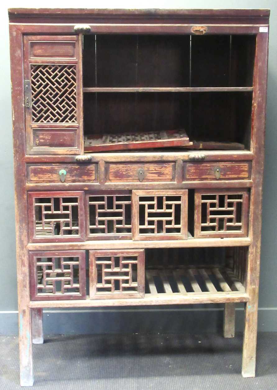 Lot 458 - A Chinese hardwood game larder with open fret...