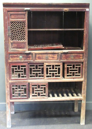Lot 458 - A Chinese hardwood game larder with open fret...
