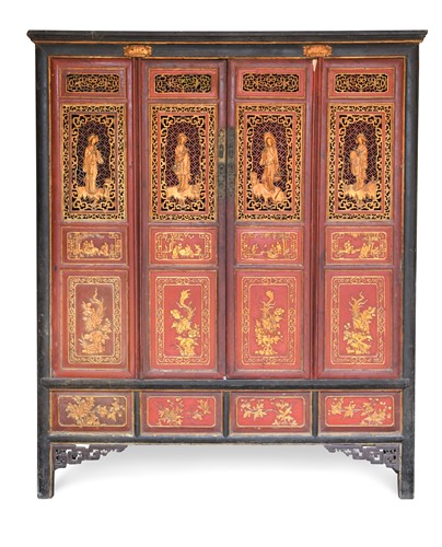 Lot 114 - A Chinese carved wood parcel gilt and red lacquered four-panel cupboard