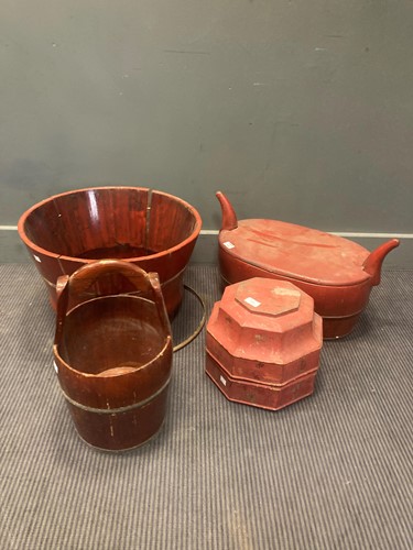 Lot 496 - A collection of four red painted wooden food...