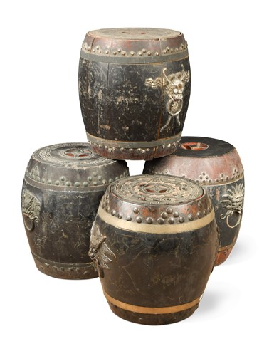 Lot 106 - A group of four Chinese black lacquered and staved wood lidded rice barrels, late Qing Dynasty