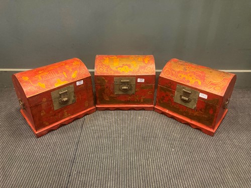 Lot 498 - Three Chinese red painted dome topped boxes,...