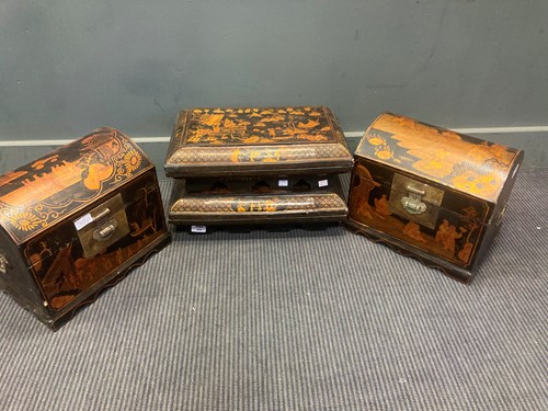 Lot 499 - A pair of Chinese black and gilt painted dome...