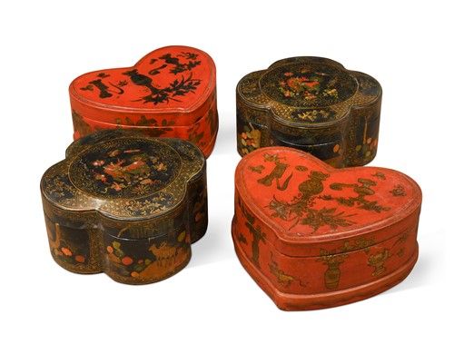 Lot 109 - A pair of Chinese red lacquered and gilt heart shape lidded boxes, mid 20th century