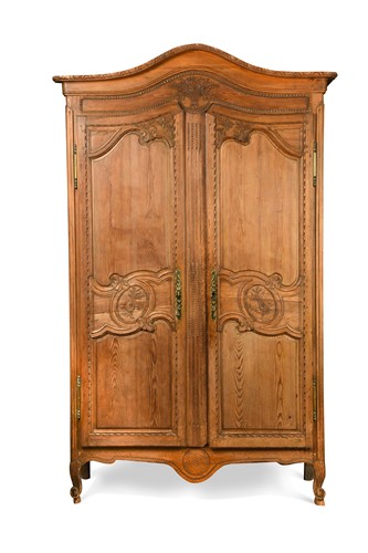 Lot 649 - A French Louis XV style pine armoire, 19th century