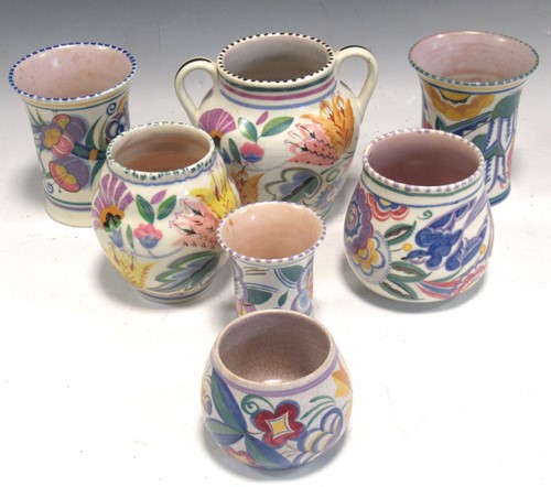 Lot 31 - Seven Poole Pottery vases, one with two...