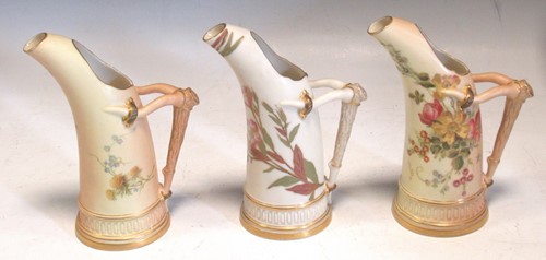 Lot 42 - Three Worcester jugs with faux stag antler...