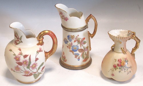 Lot 41 - Three Worcester blush ivory jugs, decorated...